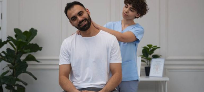 Physiotherapist performing manual therapy for spine conditions