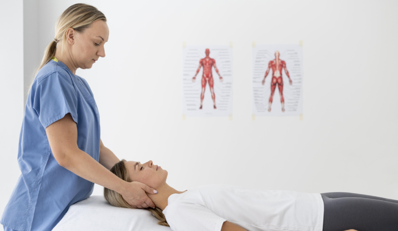 Physiotherapist guiding a patient through neck stretching exercises