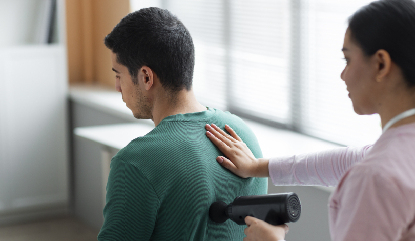 "Patient undergoing manual therapy for frozen shoulder treatment.