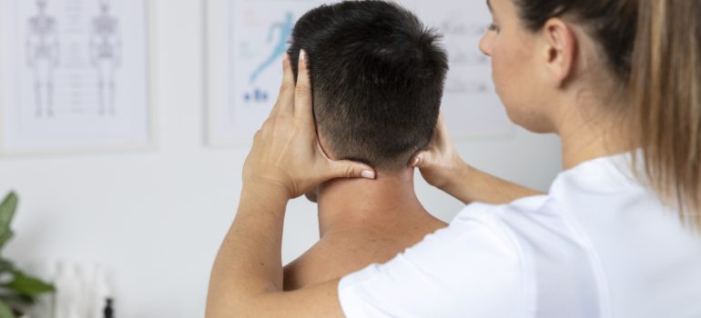 Patient receiving manual therapy for neck pain relief