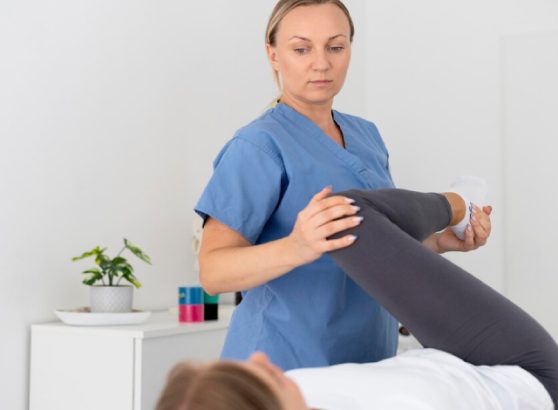 Patient undergoing knee pain physiotherapy at a local clinic.